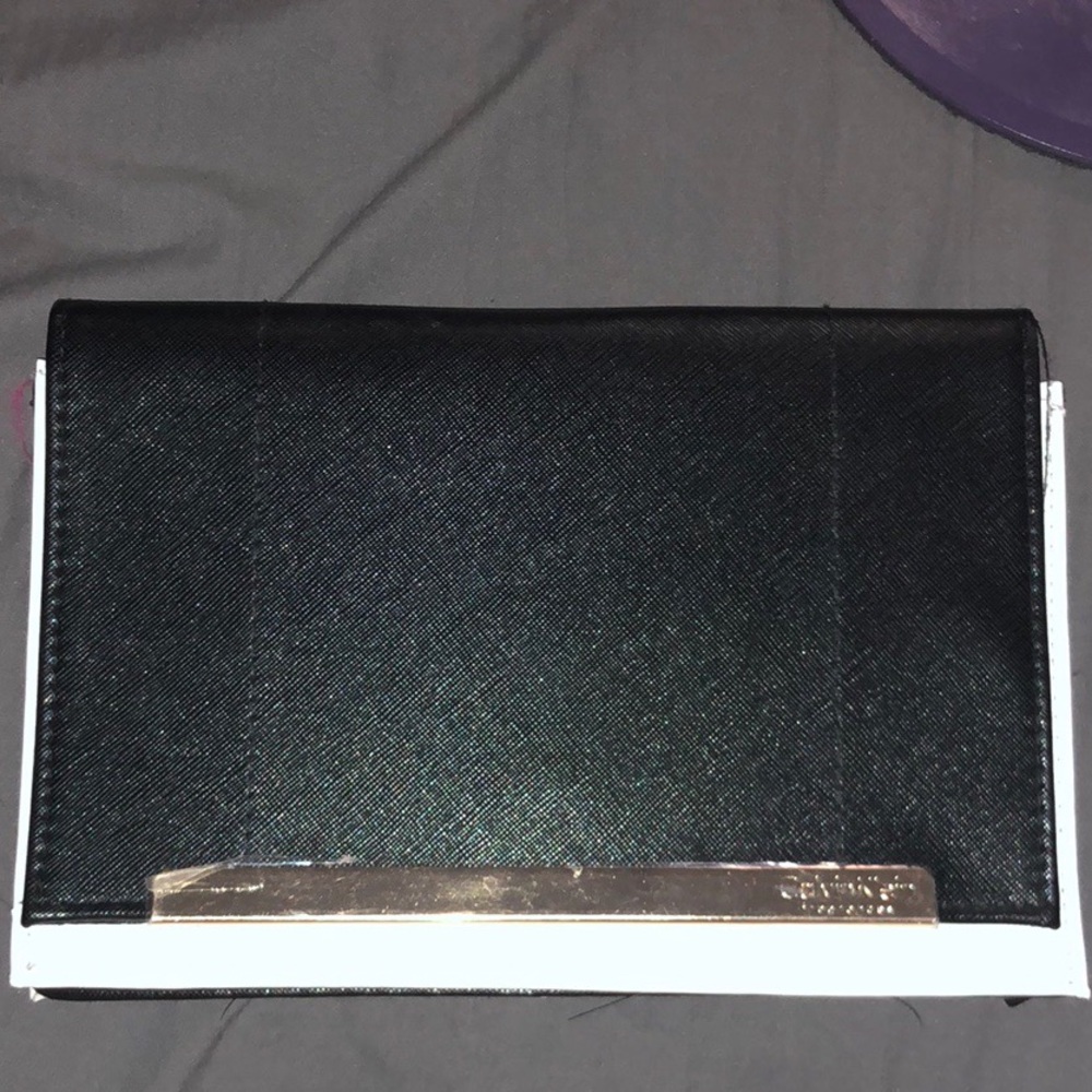 Black and white Calvin Klein clutch